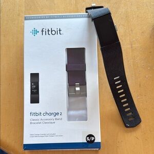 Fitbit Charge 2 Black Fitness Tracker
Comes with charger and extra band.